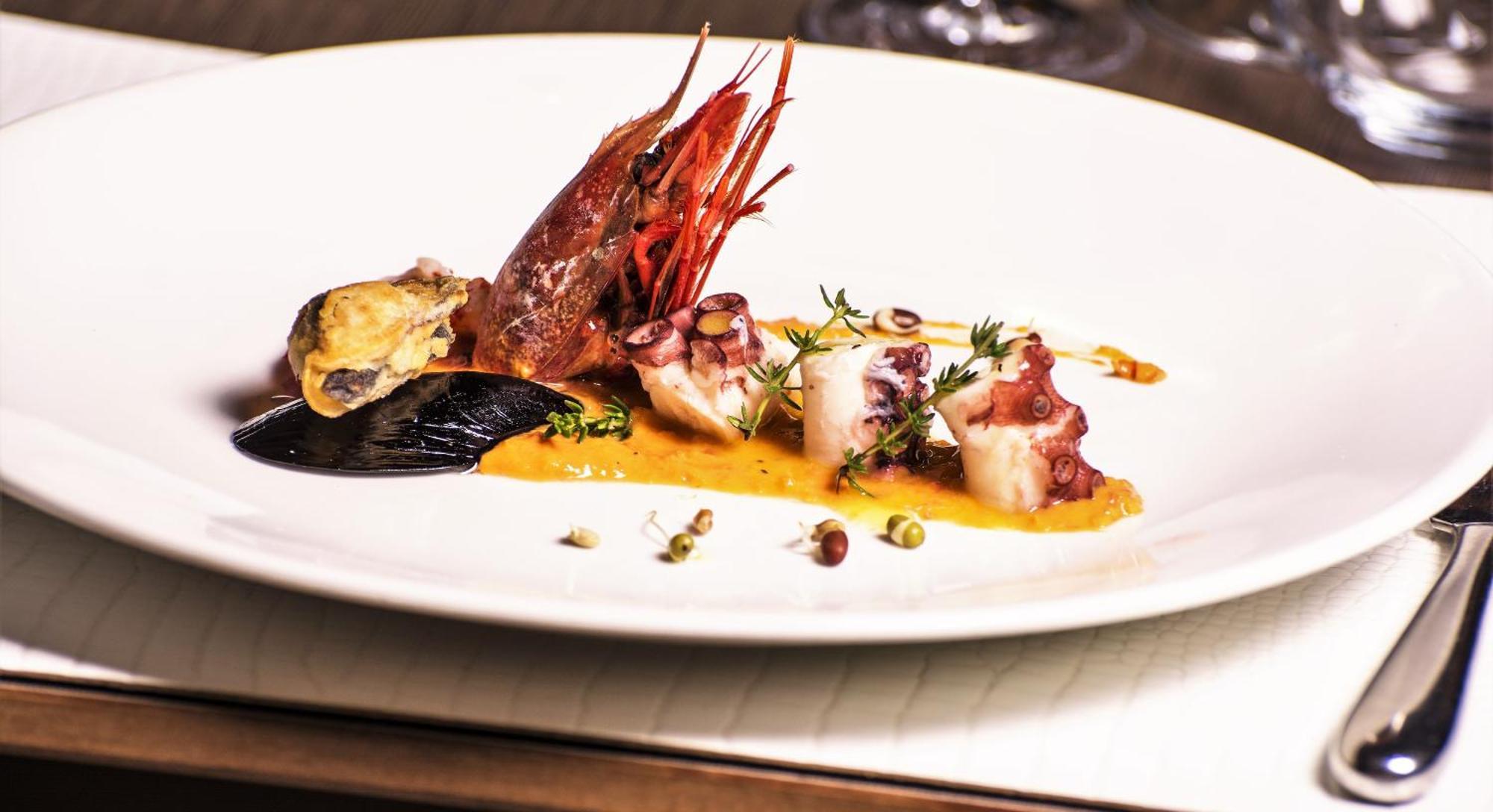 Miramare The Palace Resort Sanremo Esterno foto A seafood dish